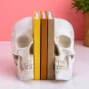 Ditverzinjeniet Boekensteunen|Schedel boekensteunen (set van 2)